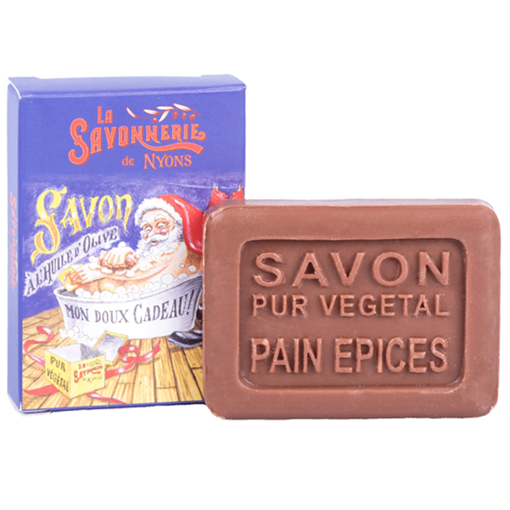 Mini savon rectangle de 25g à la canelle et à l'orange avec un emballage papier illustré par un traineau Pere Noel de la collection "Mini savons" - Fabriqué en France par La Savonnerie de Nyons