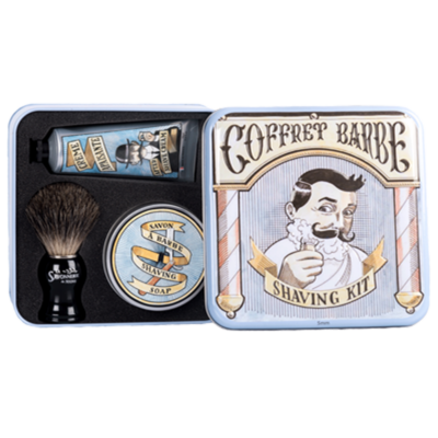 Boite coffret en metal vintage illustrée par un dessin representant un barbier. La boite contient un savon de rasage, un blaireau et une crème apaisante de la collection "Barbe et Alun" - Fabriqué en France par La Savonnerie de Nyons