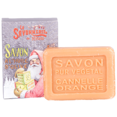 Mini savon rectangle de 25g à la canelle et à l'orange avec un emballage papier illustré par un Pere Noel de la collection "Mini savons" - Fabriqué en France par La Savonnerie de Nyons