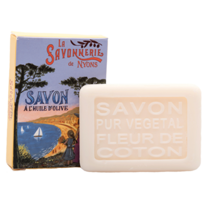 Mini savon rectangle de 25g à la fleur de coton avec un emballage papier illustré par un paysage de Cote d'Azur de la collection "Mini savons" - Fabriqué en France par La Savonnerie de Nyons